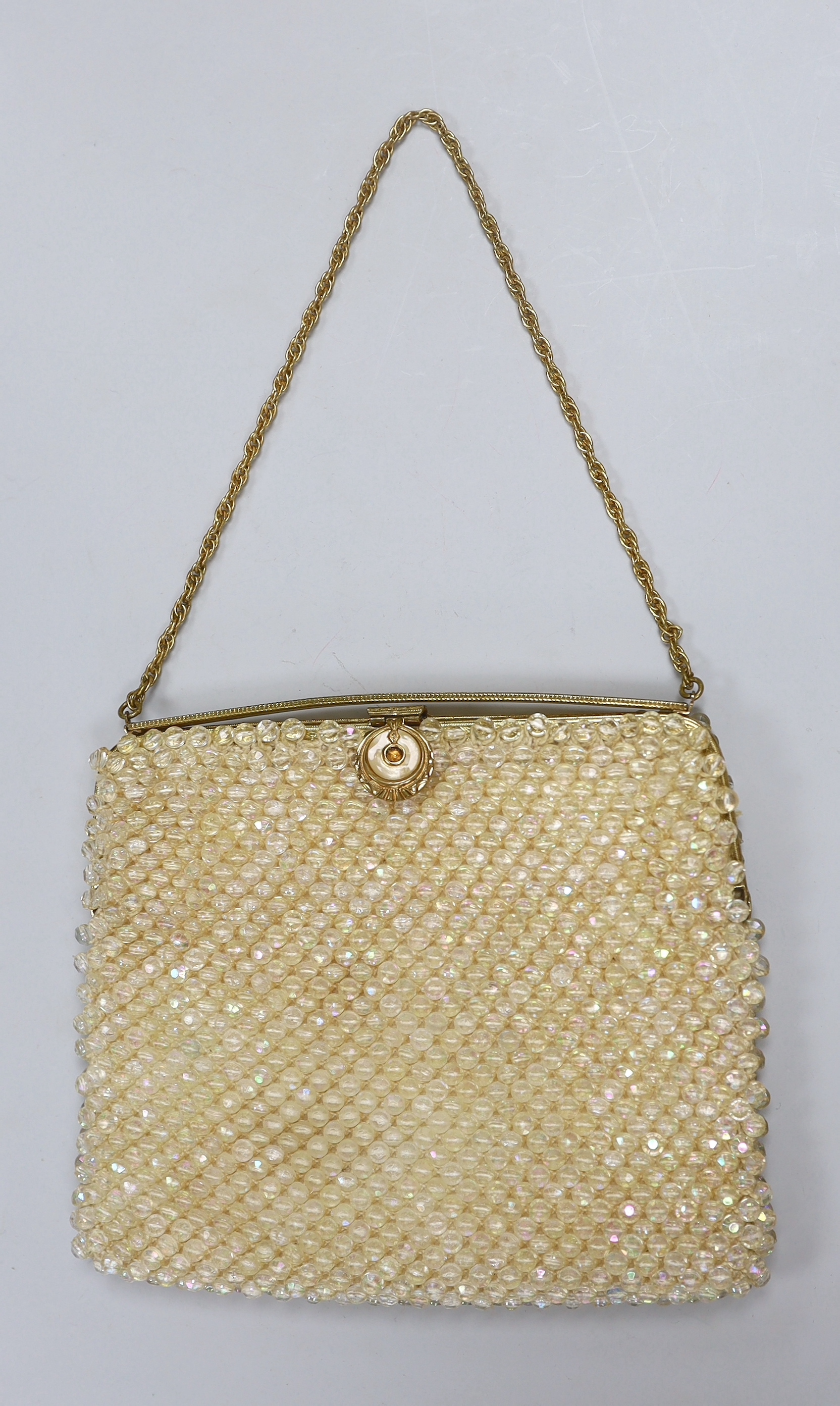 An evening purse, a shawl and pair of blue gloves